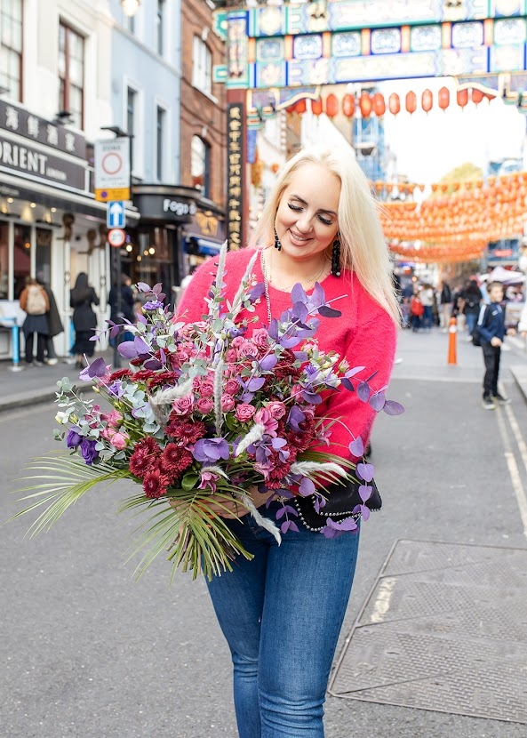 Fun and cheerful pink and purple bouquet dressed with wild foliages. Made by Blooms and Candy London florist with guaranteed London, UK flower delivery